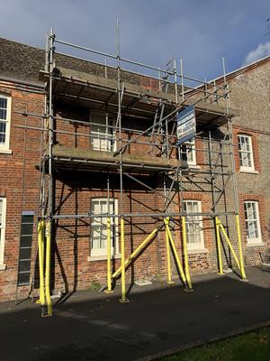 Historic brick building scaffolding second angle