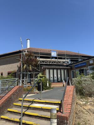 Hospital north entrance scaffolding with THF banner