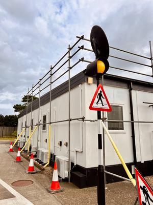 Portacabin scaffolding with traffic management and pedestrian signs