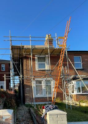 Victorian brick house scaffolding for chimney work