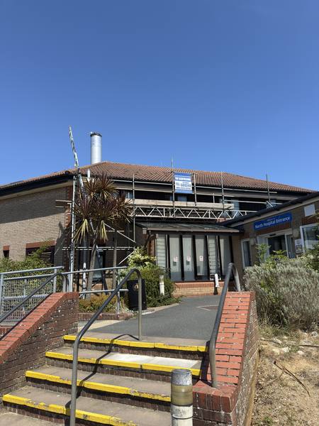 Hospital building scaffolding with THF banner